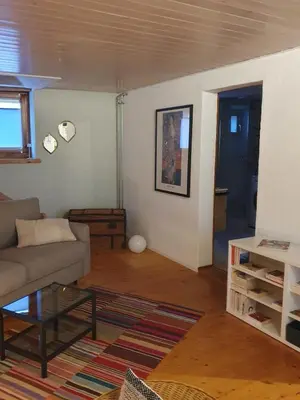 Ein Sitzbereich in der Unterkunft Jolie maison de vacances au village