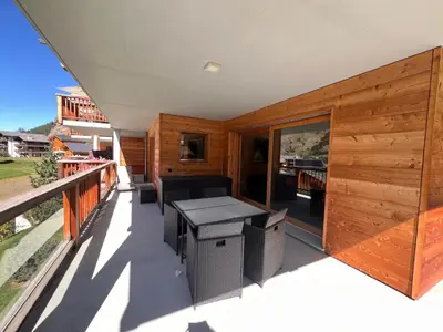 Ein Balkon oder eine Terrasse in der Unterkunft Résidence Lisaride à Evolène - appartement spacieux et lumineux avec vue