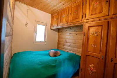 Ein Bett oder Betten in einem Zimmer der Unterkunft Chalet Mazze