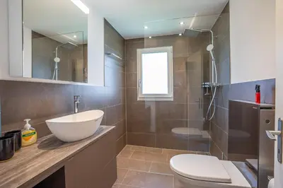 Ein Badezimmer in der Unterkunft Chalet Mazze