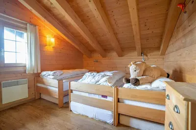 Ein Bett oder Betten in einem Zimmer der Unterkunft Chalet Bachteln