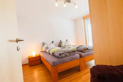 Ein Bett oder Betten in einem Zimmer der Unterkunft Riederhoru A Parterre