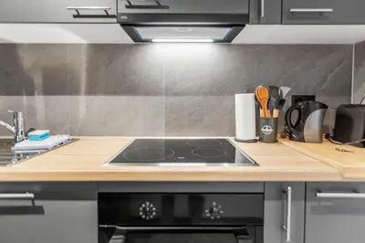 Küche/Küchenzeile in der Unterkunft Logement rénové proche remontées - Idéal famille