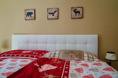 Ein Bett oder Betten in einem Zimmer der Unterkunft Chalet zur Höhe