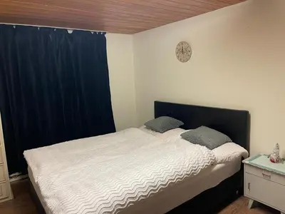 Ein Bett oder Betten in einem Zimmer der Unterkunft Home 6