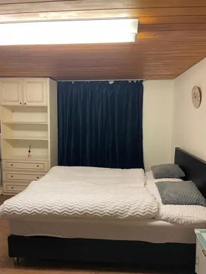 Ein Bett oder Betten in einem Zimmer der Unterkunft Home 6