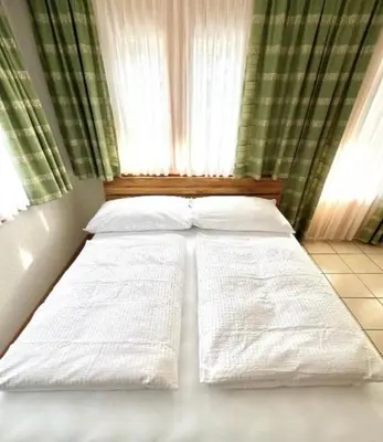Ein Bett oder Betten in einem Zimmer der Unterkunft Studio Laralax