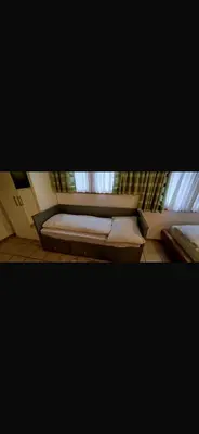 Ein Bett oder Betten in einem Zimmer der Unterkunft Studio Laralax