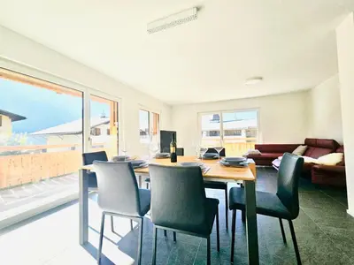 Ein Sitzbereich in der Unterkunft Premium Jungfrau Apartment