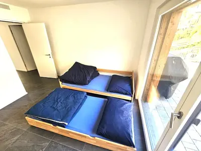 Ein Bett oder Betten in einem Zimmer der Unterkunft Premium Jungfrau Apartment