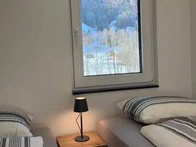 Ein Bett oder Betten in einem Zimmer der Unterkunft Deine Auszeit mit Alpen- und Kanderblick