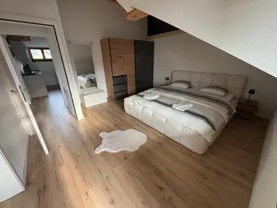 Ein Bett oder Betten in einem Zimmer der Unterkunft Deine Auszeit mit Alpen- und Kanderblick