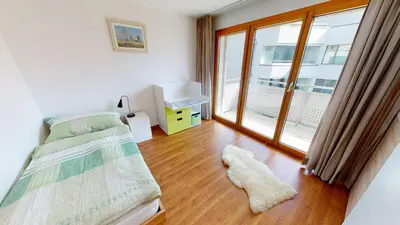 Ein Bett oder Betten in einem Zimmer der Unterkunft Bijou in Mitten von Naters