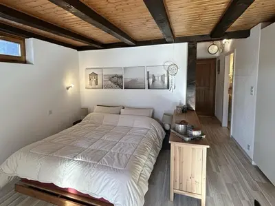 Ein Bett oder Betten in einem Zimmer der Unterkunft Le Studio du Rhône