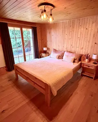 Ein Bett oder Betten in einem Zimmer der Unterkunft La Marmotte