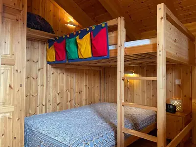 Ein Bett oder Betten in einem Zimmer der Unterkunft Les Lupins