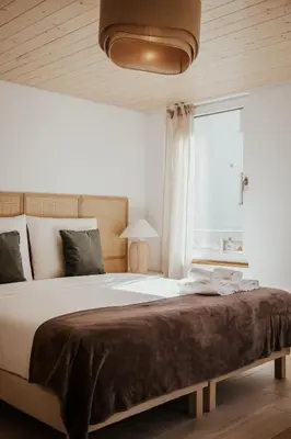 Ein Bett oder Betten in einem Zimmer der Unterkunft Hidden Retreats The AlpVillage Retreat