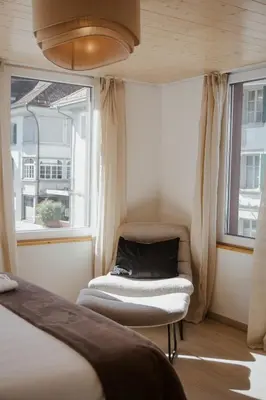Ein Bett oder Betten in einem Zimmer der Unterkunft Hidden Retreats The AlpVillage Retreat