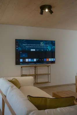 TV/Unterhaltungsangebot in der Unterkunft Hidden Retreats The AlpVillage Retreat