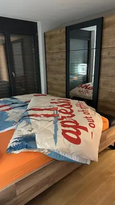 Ein Bett oder Betten in einem Zimmer der Unterkunft Bergperle