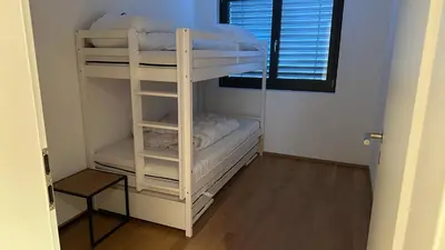 Ein Bett oder Betten in einem Zimmer der Unterkunft Bergperle
