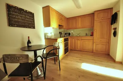 Küche/Küchenzeile in der Unterkunft Seegärtli Riverside Apartment