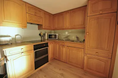 Küche/Küchenzeile in der Unterkunft Seegärtli Riverside Apartment