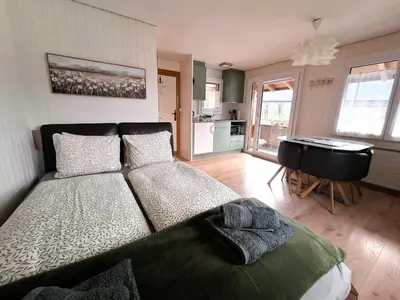 Ein Bett oder Betten in einem Zimmer der Unterkunft The Boat House