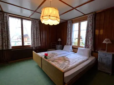 Ein Bett oder Betten in einem Zimmer der Unterkunft Edelweiss Lodge
