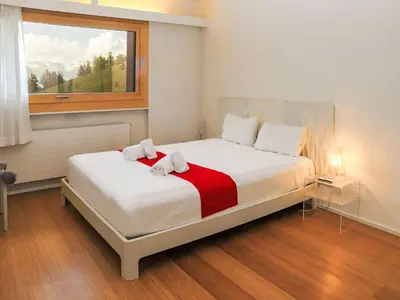 Ein Bett oder Betten in einem Zimmer der Unterkunft Apartment Rosablanche D44 by Interhome