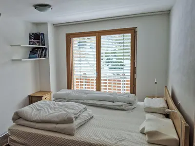 Ein Bett oder Betten in einem Zimmer der Unterkunft Apartment Perrine by Interhome