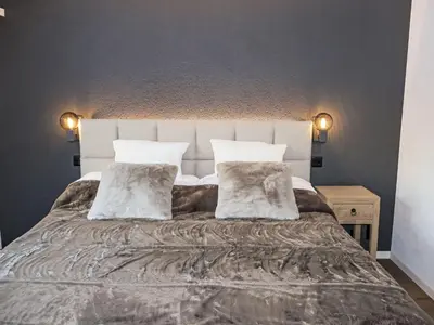 Ein Bett oder Betten in einem Zimmer der Unterkunft Apartment Chez Gredia by Interhome