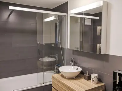 Ein Badezimmer in der Unterkunft Apartment Chez Gredia by Interhome