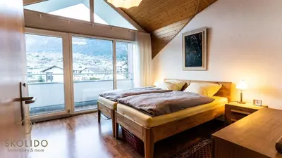 Ein Bett oder Betten in einem Zimmer der Unterkunft Holidayapartment Kirchweg, Glis