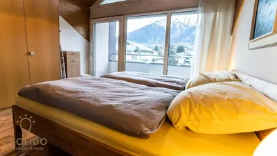 Ein Bett oder Betten in einem Zimmer der Unterkunft Holidayapartment Kirchweg, Glis