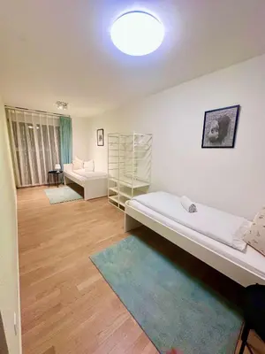 Ein Bett oder Betten in einem Zimmer der Unterkunft Interlaken Peak View