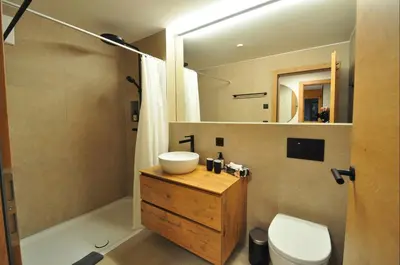 Ein Badezimmer in der Unterkunft Tossu, Haus Metropol B