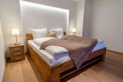 Ein Bett oder Betten in einem Zimmer der Unterkunft Interlaken Mountain View