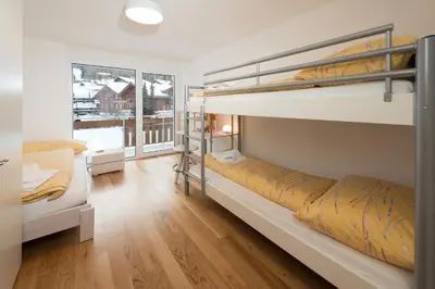 Ein Bett oder Betten in einem Zimmer der Unterkunft Millegga Grächen