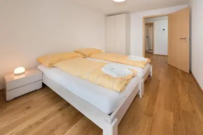 Ein Bett oder Betten in einem Zimmer der Unterkunft Millegga Grächen