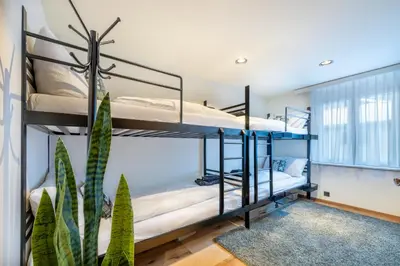 Ein Bett oder Betten in einem Zimmer der Unterkunft Alpine black Pearl - modern & stylish by Inspiringplaces Zermatt