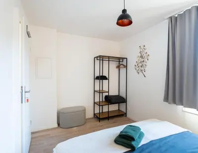 Ein Bett oder Betten in einem Zimmer der Unterkunft Central City Apartment 1 with Mountain View