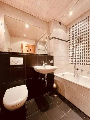 Ein Badezimmer in der Unterkunft Appartement complet dans le centre de Crans-Montana