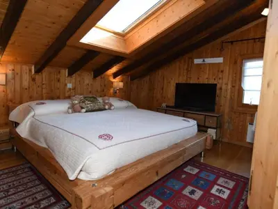 Ein Bett oder Betten in einem Zimmer der Unterkunft Holiday Home Chalet Mein Traum by Interhome