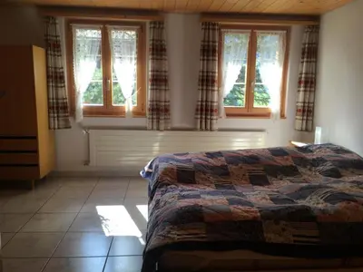 Ein Bett oder Betten in einem Zimmer der Unterkunft Apartment Frohmatt by Interhome