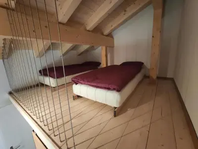 Ein Bett oder Betten in einem Zimmer der Unterkunft Apartment Alpen Vista by Interhome