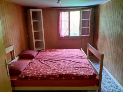 Ein Bett oder Betten in einem Zimmer der Unterkunft Holiday Home Willenschwand Adelboden by Interhome