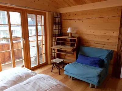 Ein Bett oder Betten in einem Zimmer der Unterkunft Apartment Chalet Ried by Interhome