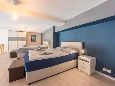 Ein Bett oder Betten in einem Zimmer der Unterkunft Apartment Loft Apartment James Höhematte by Interhome