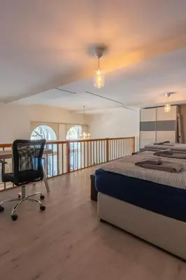 Ein Bett oder Betten in einem Zimmer der Unterkunft Apartment Loft Apartment James Höhematte by Interhome